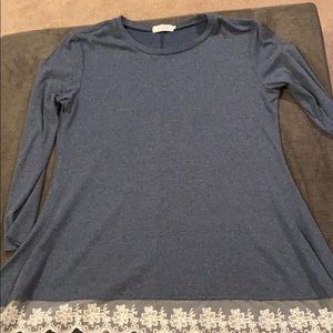 Long sleeved shirt with laced bottom